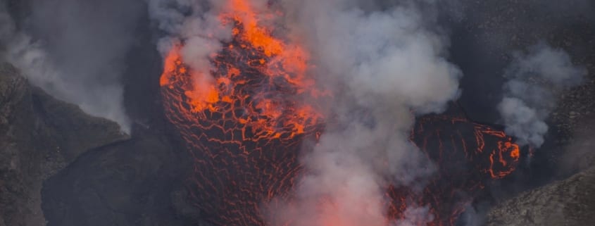 Hot steaming lava areal view of a volcano